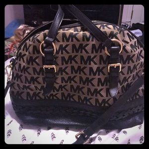 Micheal Kors bag with crossbody or shoulder strap